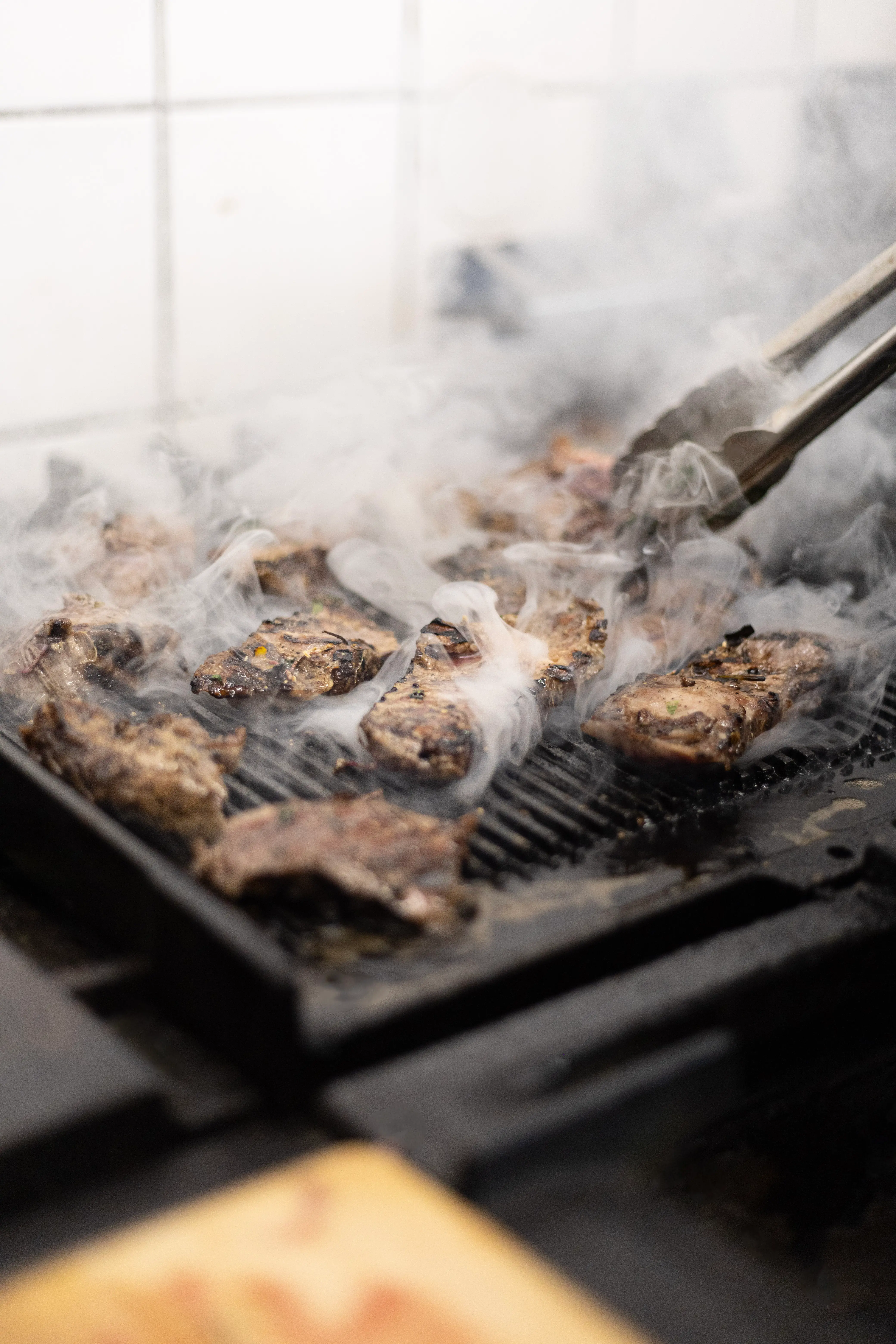 Côte de bœuf cooking on the grill