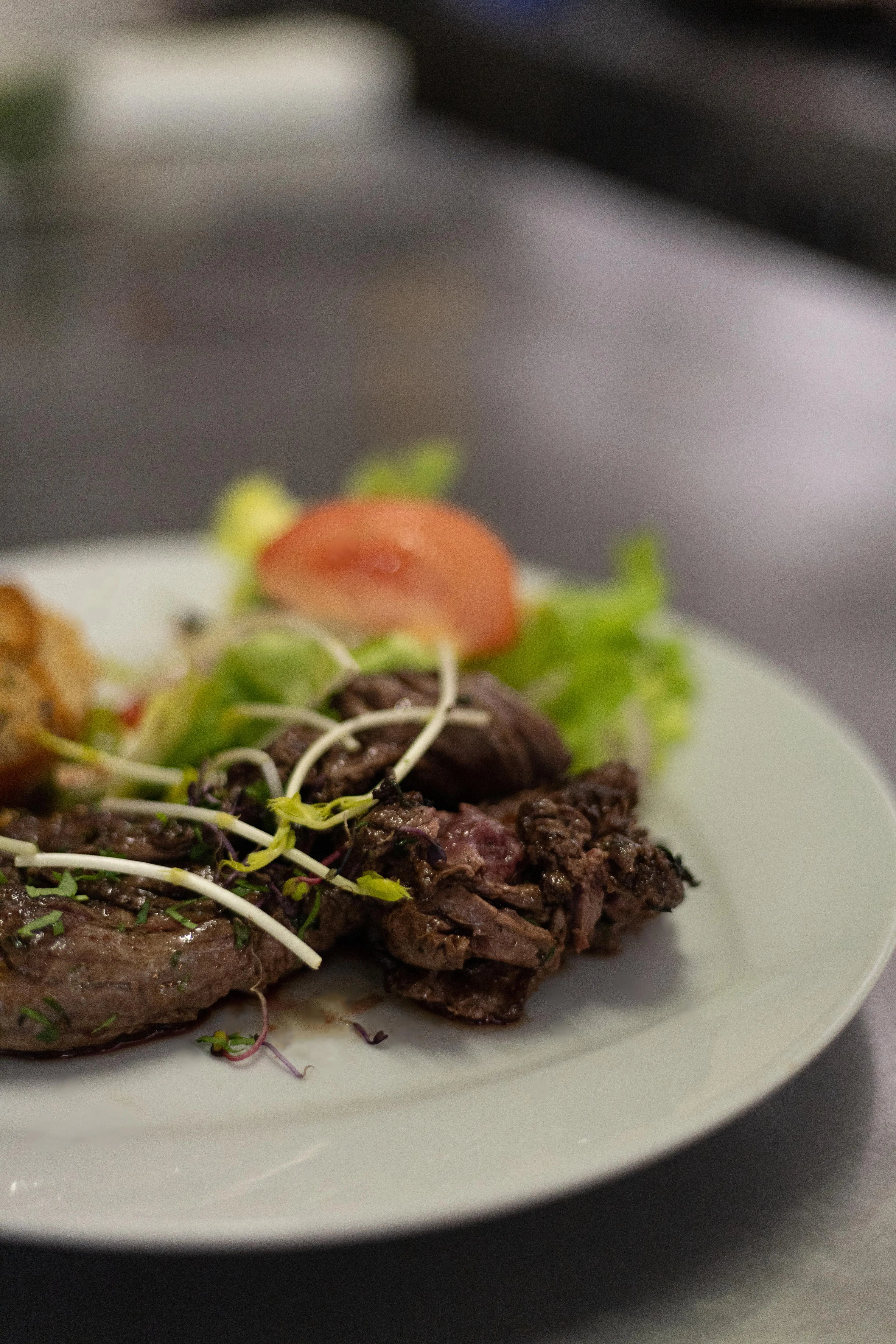Plate of meat and mixed salad, as a starter